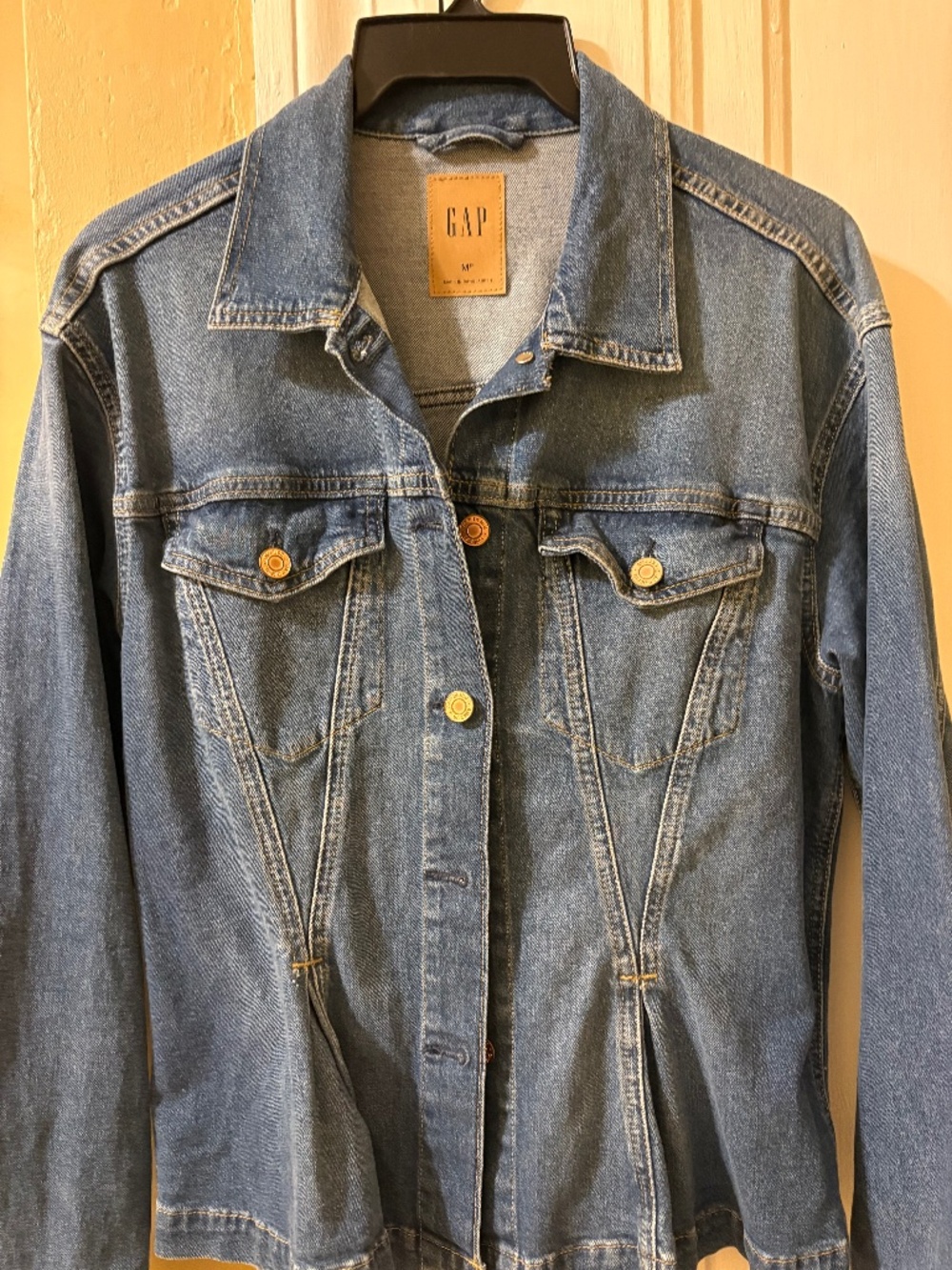 Denim jacket with peplum hem